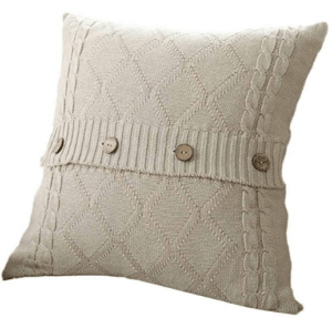 cream knitted sweater throw pillow