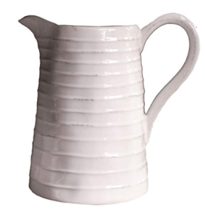 Do you look for the perfect neutral kitchen home decor at a price you can afford? This is a list of the Best Affordable White Farmhouse Pitchers. You will love this collection of kitchen pitchers. #homedecor #farmhousehomedecor #farmhousekitchen #modernfarmhouse #neutralkitchen #whitefarmhousedecor