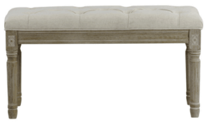 What a cute french country bench. It would look adorable at the foot of your bed.