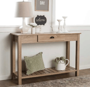 These gorgeous entryway tables are the perfect style design of industrial and rustic tables. They look great with a large mirror above and spacious drawers and storage. I love functional furniture that makes a statement.