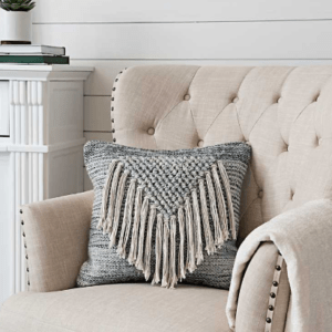 I adore unique boho fringe and textured pillows. This is the cutest boho throw pillow at an affordable price.