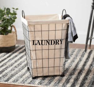 This farmhouse industrial laundry basket is adorable. I love that it is cute and functional.