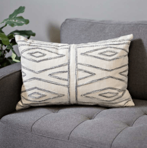 I adore unique boho fringe and textured pillows. This is the cutest boho throw pillow at an affordable price.