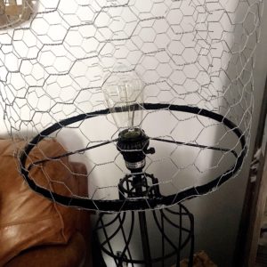 black iron farmhouse lamp with chicken wire lamp shade