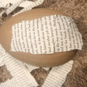 book pages glued on paper mache egg