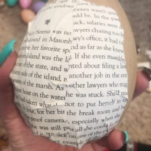 book pages glued on paper mache egg