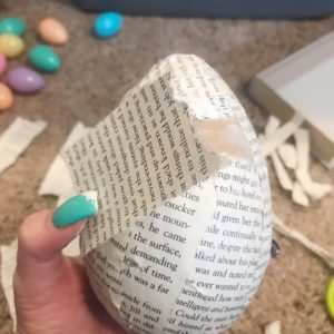 book pages glued on paper mache egg