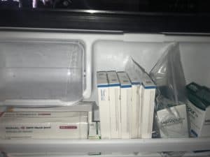 ivf medication on fridge shelf