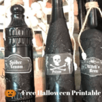 Wine bottles painted black diy halloween potion bottles with text overlay - diy potion bottles for $3 + free halloween printable